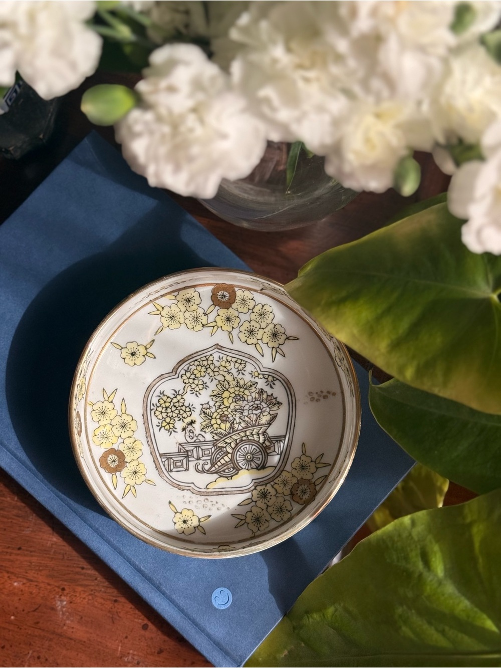 White Ceramic Decorative Bowl with Gold Floral Cart Design